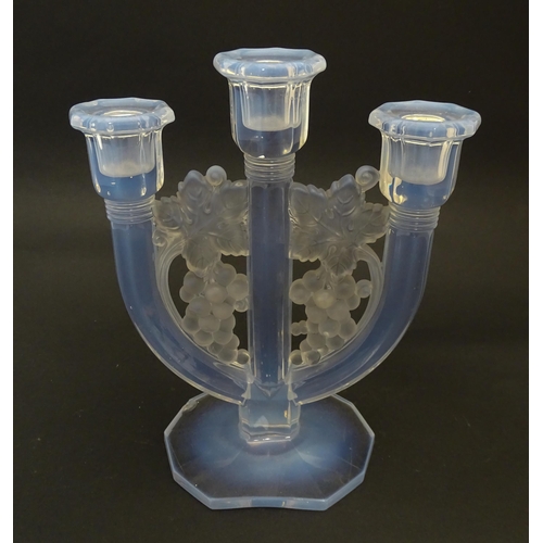 236 - An Art Deco opalescent glass candlestick by Barolac Czecho Slovakia.  Approx. 9