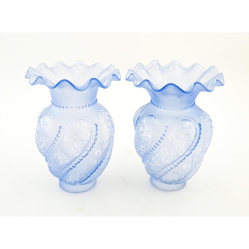 249 - Two moulded blue glass lamp shades with frilled detailing. Approx. 8 3/4