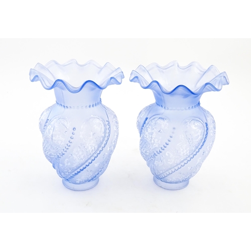 249 - Two moulded blue glass lamp shades with frilled detailing. Approx. 8 3/4