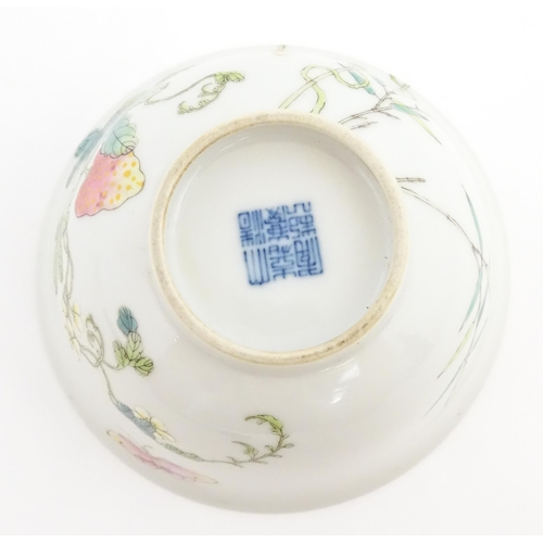 25 - A Chinese famille rose bowl and cover decorated in the Bitter Melon pattern. Bears Character marks. ... 