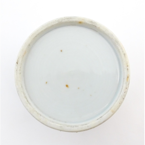 29 - A Chinese brush wash pot of circular form with a pale blue ground. Approx. 1 3/4