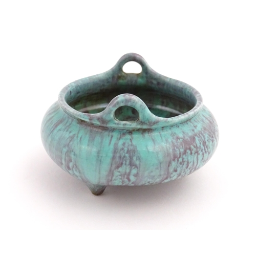 35 - A small Chinese high fired twin handled censer. Character marks under. Approx. 2 1/2