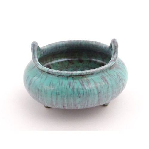 35 - A small Chinese high fired twin handled censer. Character marks under. Approx. 2 1/2