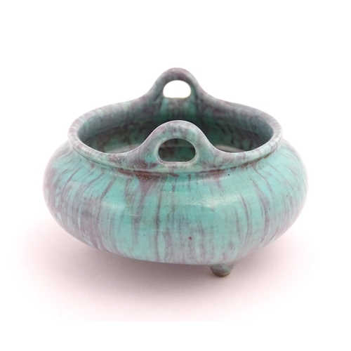 35 - A small Chinese high fired twin handled censer. Character marks under. Approx. 2 1/2