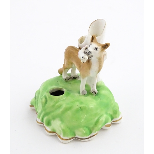 57 - A pen stand / inkwell modelled as a fox with bird. Approx. 3 1/2