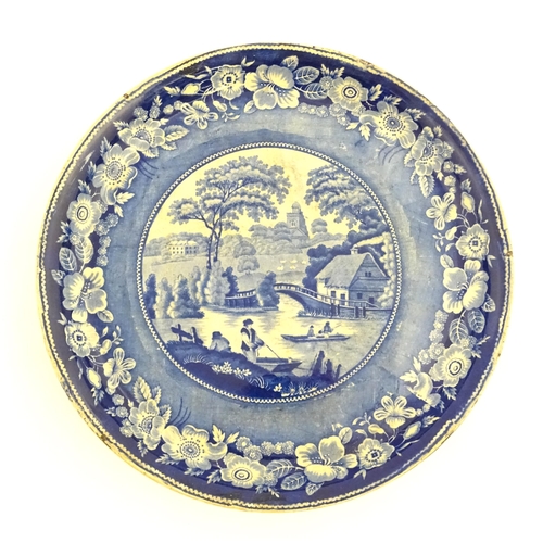 65 - A blue and white footed plate decorated with a view of Nuneham Park, Oxfordshire with wild rose bord... 