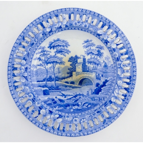 66 - A Spode blue and white ribbon plate decorated in the Tower plate. Together with a Chinese blue and w... 