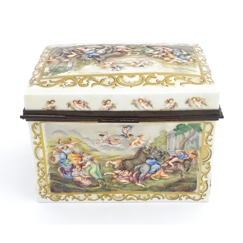 72 - A Capodimonte porcelain casket / box decorated in relief with Bacchanalian scenes, to include huntin... 