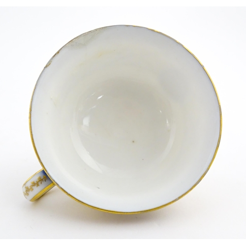 78 - A French 19thC Charles Philippe of Paris porcelain tea cup and saucer with banded decoration and gil... 