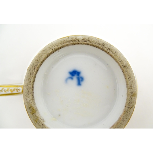 78 - A French 19thC Charles Philippe of Paris porcelain tea cup and saucer with banded decoration and gil... 