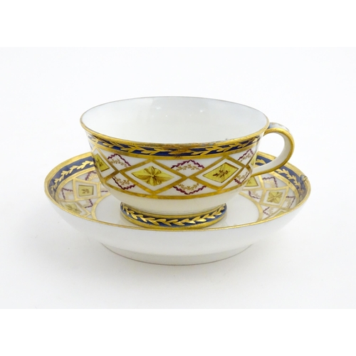 78 - A French 19thC Charles Philippe of Paris porcelain tea cup and saucer with banded decoration and gil... 