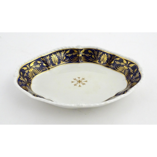 84 - A Derby dish of shaped form with cobalt blue border with gilt foliate decoration. Together with a Co... 