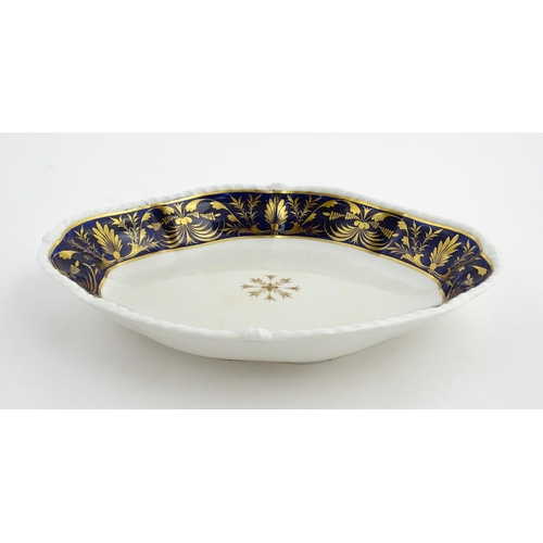 84 - A Derby dish of shaped form with cobalt blue border with gilt foliate decoration. Together with a Co... 