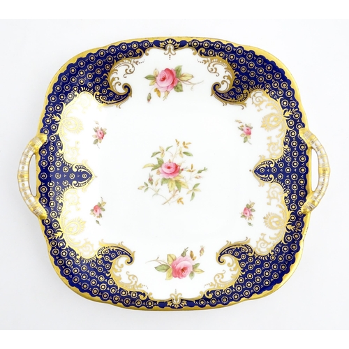 84 - A Derby dish of shaped form with cobalt blue border with gilt foliate decoration. Together with a Co... 