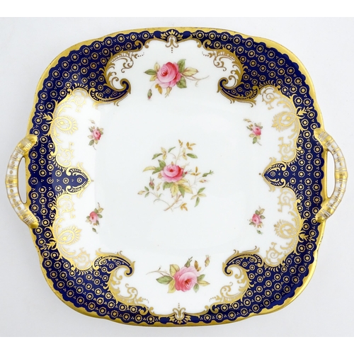 84 - A Derby dish of shaped form with cobalt blue border with gilt foliate decoration. Together with a Co... 