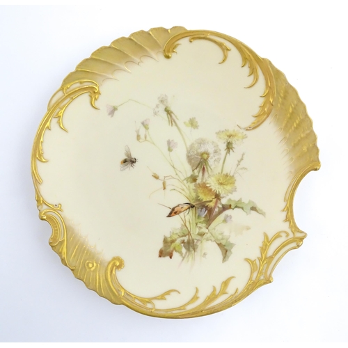 88 - Two Royal Worcester blush ivory cabinet plates, decorated with flowers, butterflies and insects. Bot... 