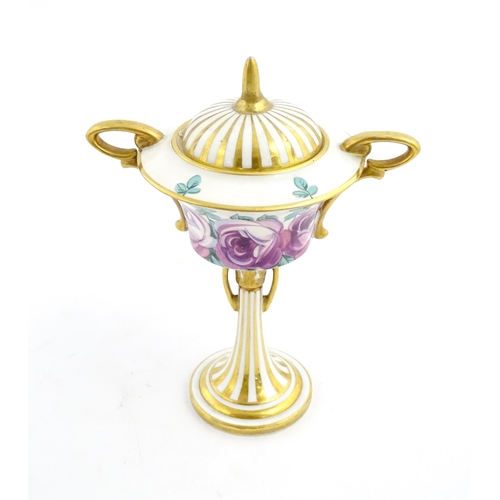 91 - A Minton Art Nouveau twin handled pedestal urn and cover with twin handles, the body with hand paint... 