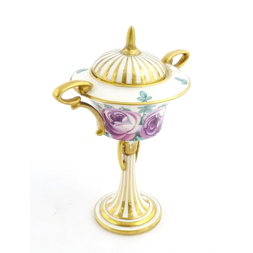 91 - A Minton Art Nouveau twin handled pedestal urn and cover with twin handles, the body with hand paint... 