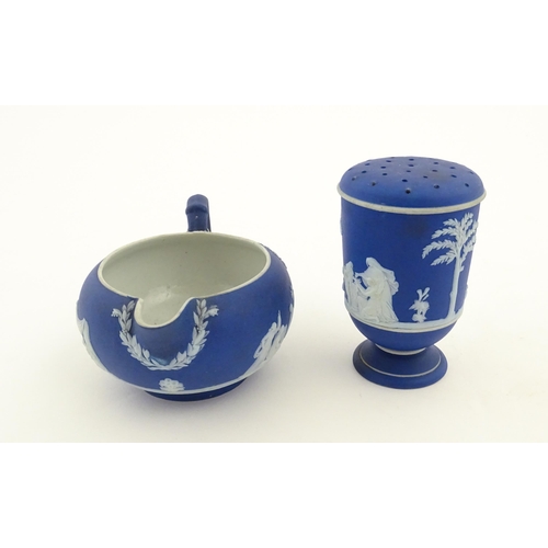 94 - A quantity of Wedgwood dark blue jasperware tea wares with applied white Classical figures and motif... 