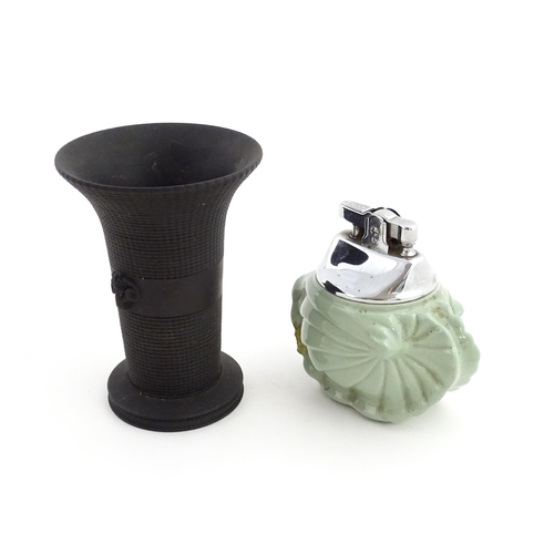 97 - A small Wedgwood basalt vase with flared rim and ram head detail. Together with a Wedgwood Celadon t... 