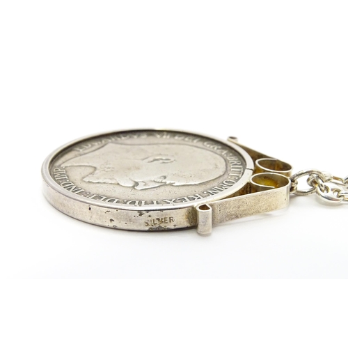 768 - Coin : A 1902 silver crown coin in captive mount on silver chain. Pendant approx. 1 1/2