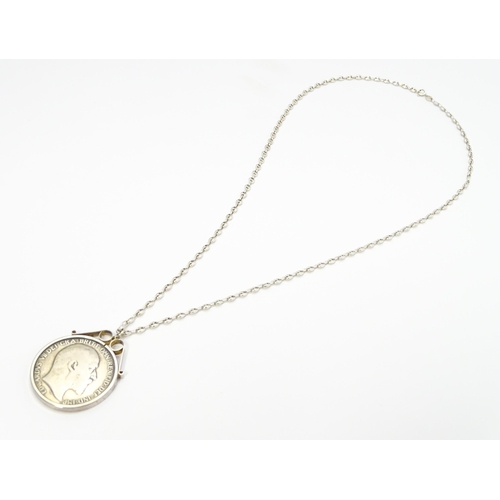 768 - Coin : A 1902 silver crown coin in captive mount on silver chain. Pendant approx. 1 1/2