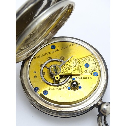 801 - A Victorian silver cased pocket watch hallmarked Birmingham 1885 maker Waltham Watch Co. Together wi... 