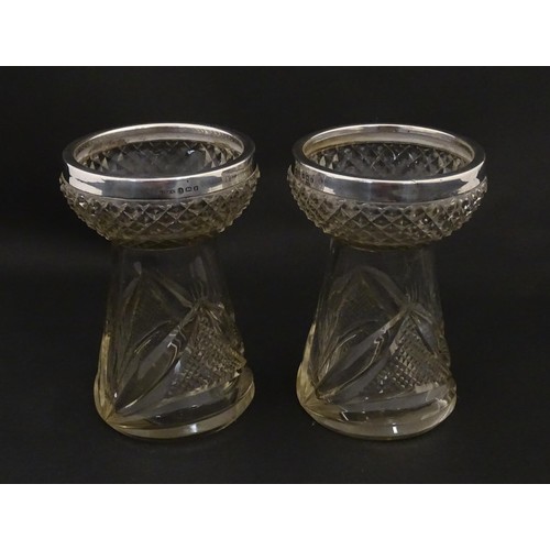 258 - A pair of cut glass vases with stylised thistle detail and silver rims hallmarked Birmingham 1906, m... 