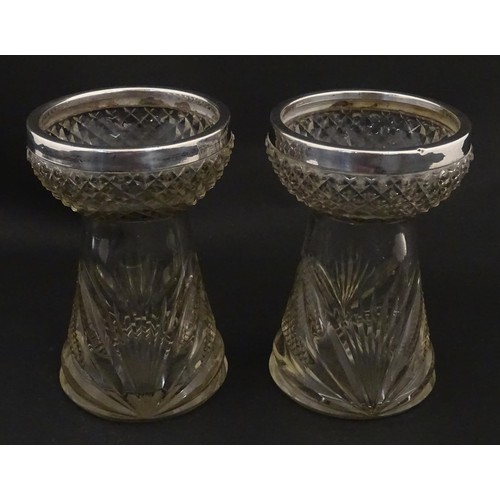 258 - A pair of cut glass vases with stylised thistle detail and silver rims hallmarked Birmingham 1906, m... 