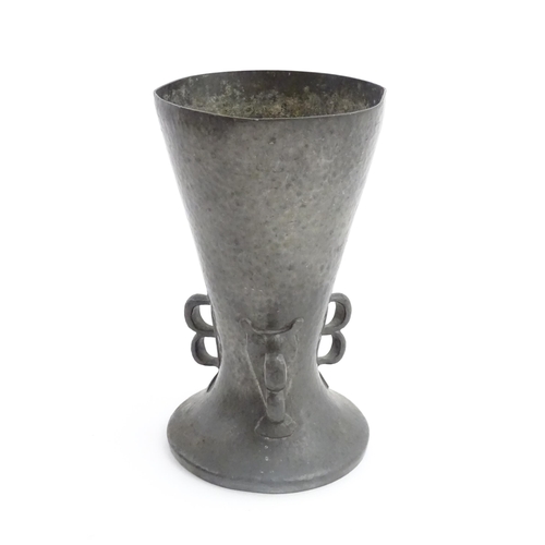 1001 - A Liberty & Co. Arts & Crafts Tudric pewter vase of flared form with hammered decoration and three d... 