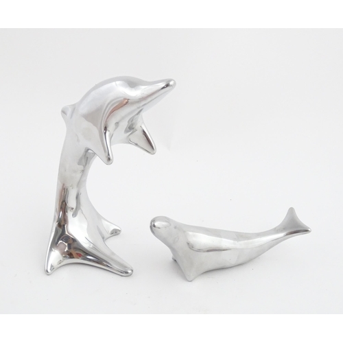 1007 - Two Canadian Hoselton sculptures, one modelled as a sealion, the other as a dolphin. Dolphin approx.... 