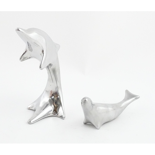 1007 - Two Canadian Hoselton sculptures, one modelled as a sealion, the other as a dolphin. Dolphin approx.... 