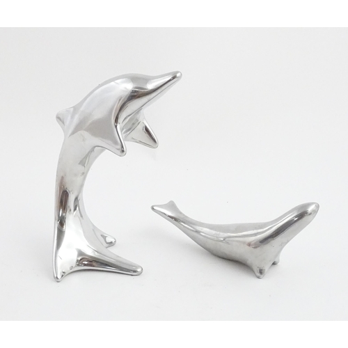 1007 - Two Canadian Hoselton sculptures, one modelled as a sealion, the other as a dolphin. Dolphin approx.... 