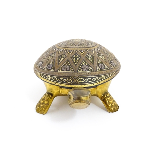 1014 - A 20thC novelty clockwork counter bell modelled as a tortoise, the shell with Damascene style decora... 