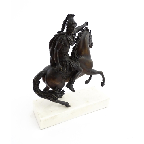 1024 - A bronze sculpture modelled as a Roman soldier on horseback. Mounted on a marble base. Approx. 16 1/... 