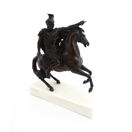 1024 - A bronze sculpture modelled as a Roman soldier on horseback. Mounted on a marble base. Approx. 16 1/... 