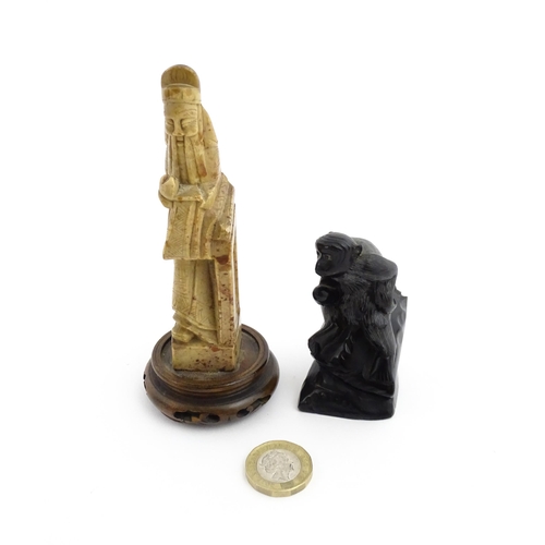 1028 - Two Chinese soapstone carvings, one modelled as a monkey, the other as a stylised sage / scholar fig... 