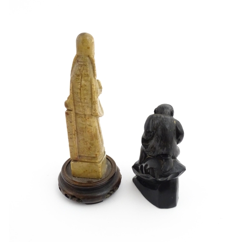 1028 - Two Chinese soapstone carvings, one modelled as a monkey, the other as a stylised sage / scholar fig... 