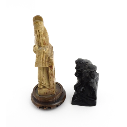 1028 - Two Chinese soapstone carvings, one modelled as a monkey, the other as a stylised sage / scholar fig... 