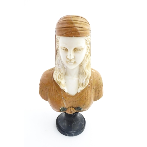 1063 - A 20thC marble bust depicting a female woman wearing a headdress, on a turned socle. Approx. 12