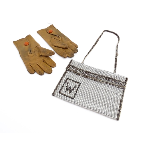 1080 - A pair of early 20thC childrens kid leather gloves. Together with a beadwork bag (2). Gloves approx.... 