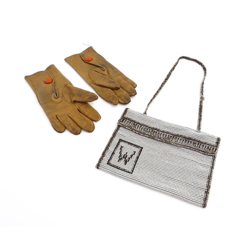 1080 - A pair of early 20thC childrens kid leather gloves. Together with a beadwork bag (2). Gloves approx.... 