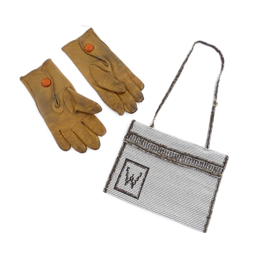 1080 - A pair of early 20thC childrens kid leather gloves. Together with a beadwork bag (2). Gloves approx.... 