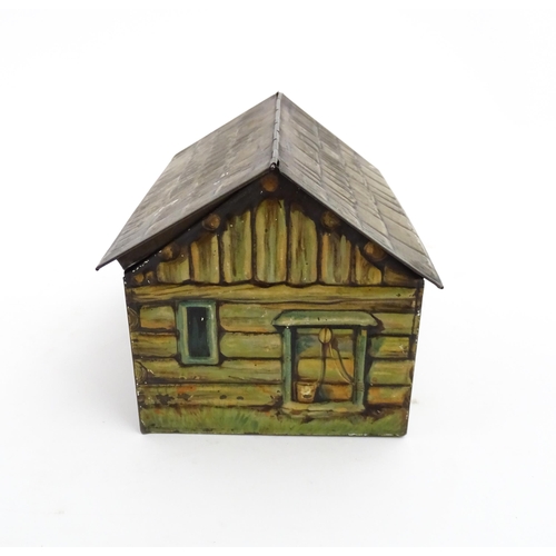 1100 - A novelty S. Henderson & Sons Ltd. biscuit tin formed as a log cabin, with figures, a dog and a hors... 