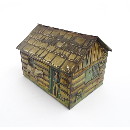 1100 - A novelty S. Henderson & Sons Ltd. biscuit tin formed as a log cabin, with figures, a dog and a hors... 