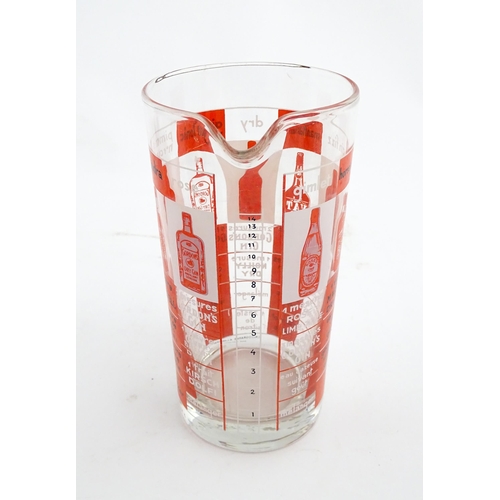 1104 - A 20thC glass cocktail measure decorated with nine cocktail recipes. Marked to rim of base Calcograp... 