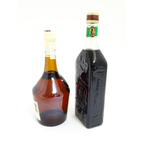 1124 - A 70cl bottle of Benedictine liqueur, together with a 70cl bottle of Schwarzwälder Edel-Kirsch lique... 