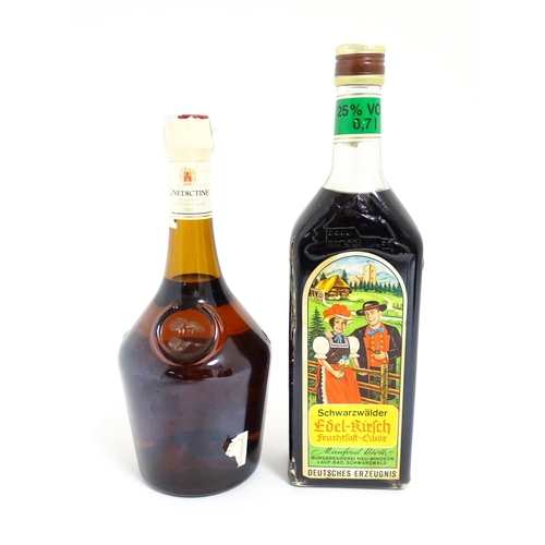 1124 - A 70cl bottle of Benedictine liqueur, together with a 70cl bottle of Schwarzwälder Edel-Kirsch lique... 