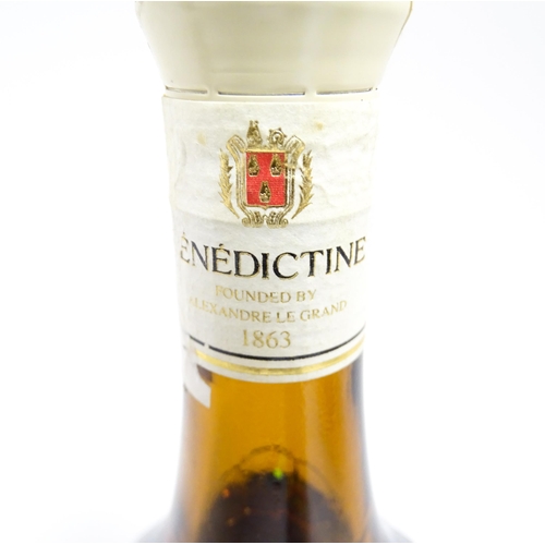 1124 - A 70cl bottle of Benedictine liqueur, together with a 70cl bottle of Schwarzwälder Edel-Kirsch lique... 