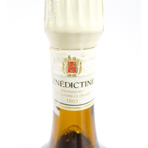 1124 - A 70cl bottle of Benedictine liqueur, together with a 70cl bottle of Schwarzwälder Edel-Kirsch lique... 